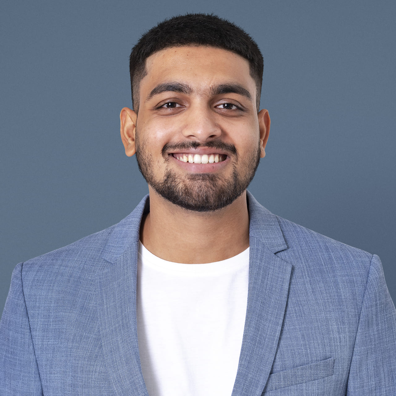 cheerful-indian-businessman-smiling-closeup-portrait-jobs-career-campaign (1)